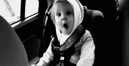 A black-and-white sequence of six photos shows a young child in a car seat, initially with a shocked expression, then…