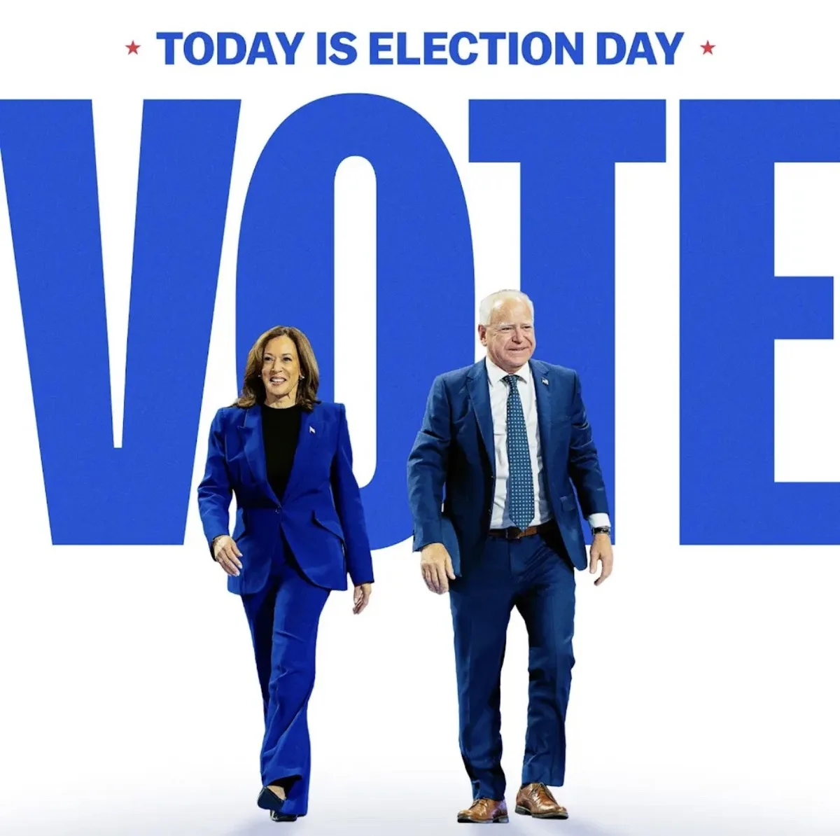 Two people, Kamala Harris and Joe Biden, are walking forward in front of a large blue 'VOTE' text. Above them, the phrase…