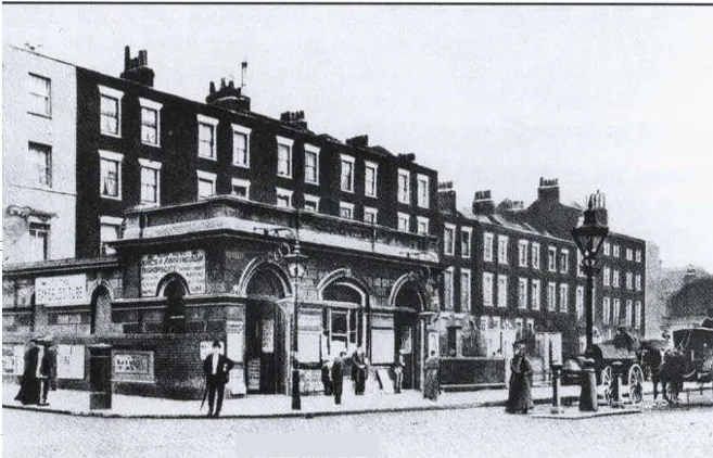 a vintage black-and-white photograph of a historic pub corner with arched windows and period architecture, featuring…