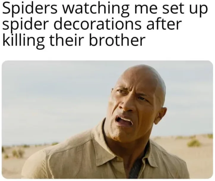 The image shows Dwayne 'The Rock' Johnson with a shocked, horrified facial expression, mouth open, in a desert setting. The…