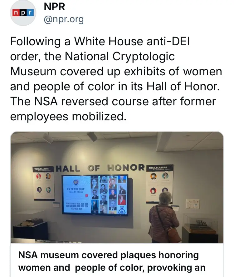 A photo shows a museum's 'Hall of Honor' with a large screen displaying only white male portraits, flanked by posters with…