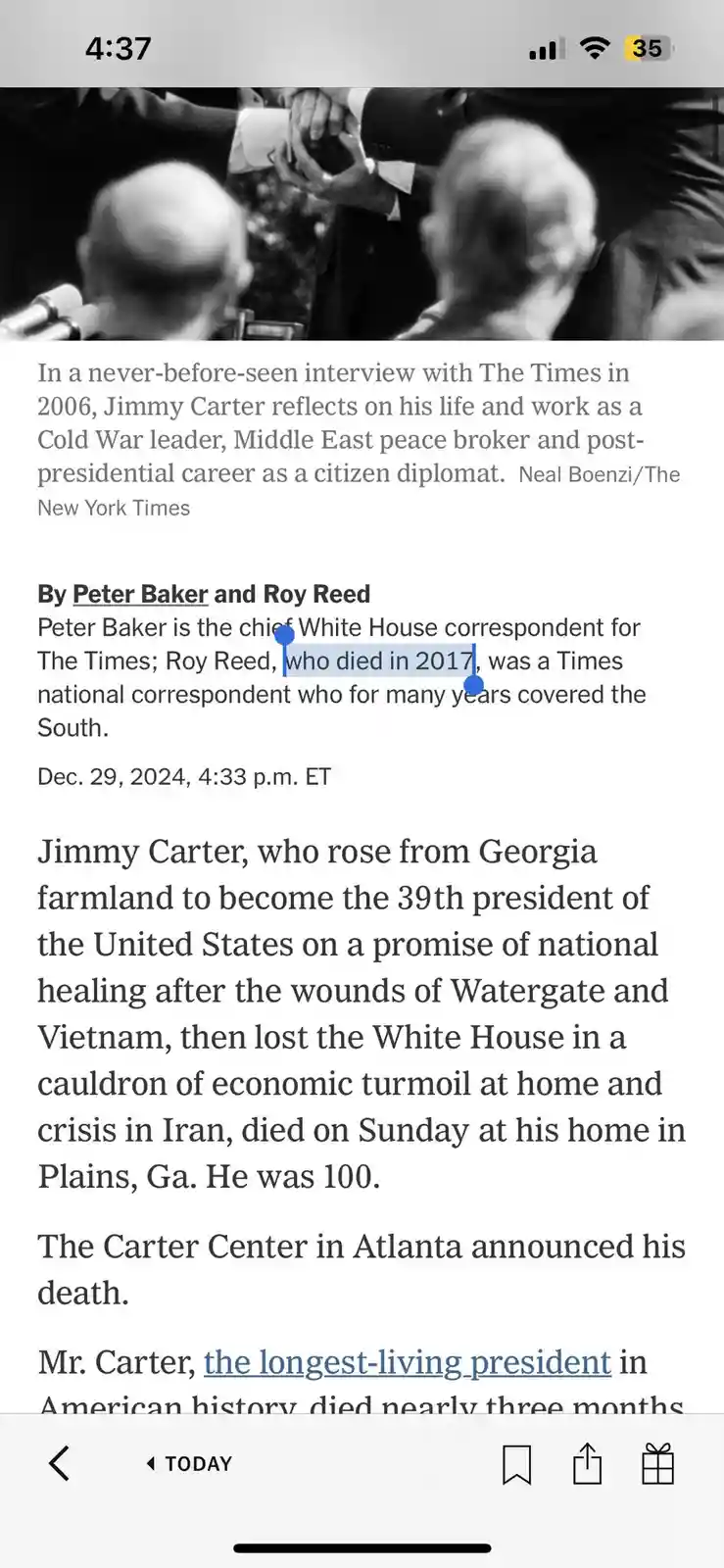 A screenshot of a New York Times article about Jimmy Carter's death, with a blue highlight and blue dots placed over the…
