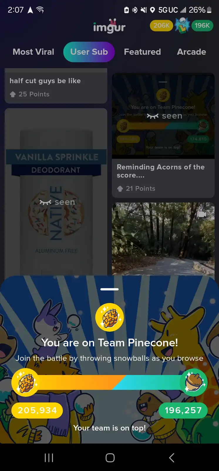 An Imgur mobile app screenshot showing a 'Team Pinecone' battle overlay with cartoon animals and scores, overlaid on a…