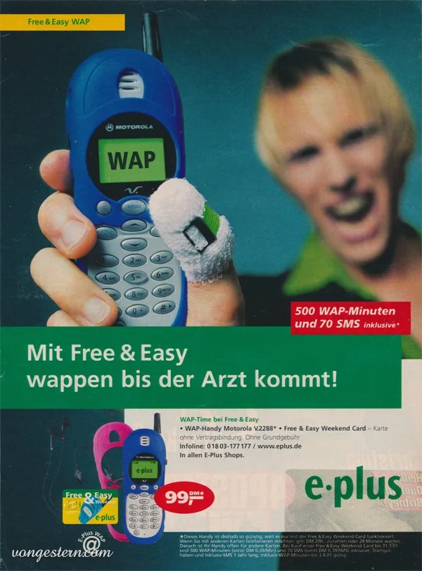 A vintage German mobile phone advertisement featuring a hand holding a blue Motorola phone with 'WAP' displayed on its…