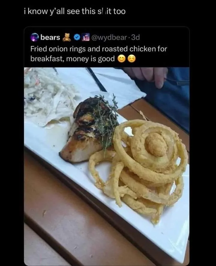 A screenshot of a social media post showing a plate of fried onion rings and roasted chicken with coleslaw, overlaid with…