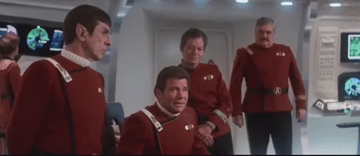 The image is a two-panel meme from Star Trek: The Next Generation. The top panel shows the crew in the ship's bridge, with…
