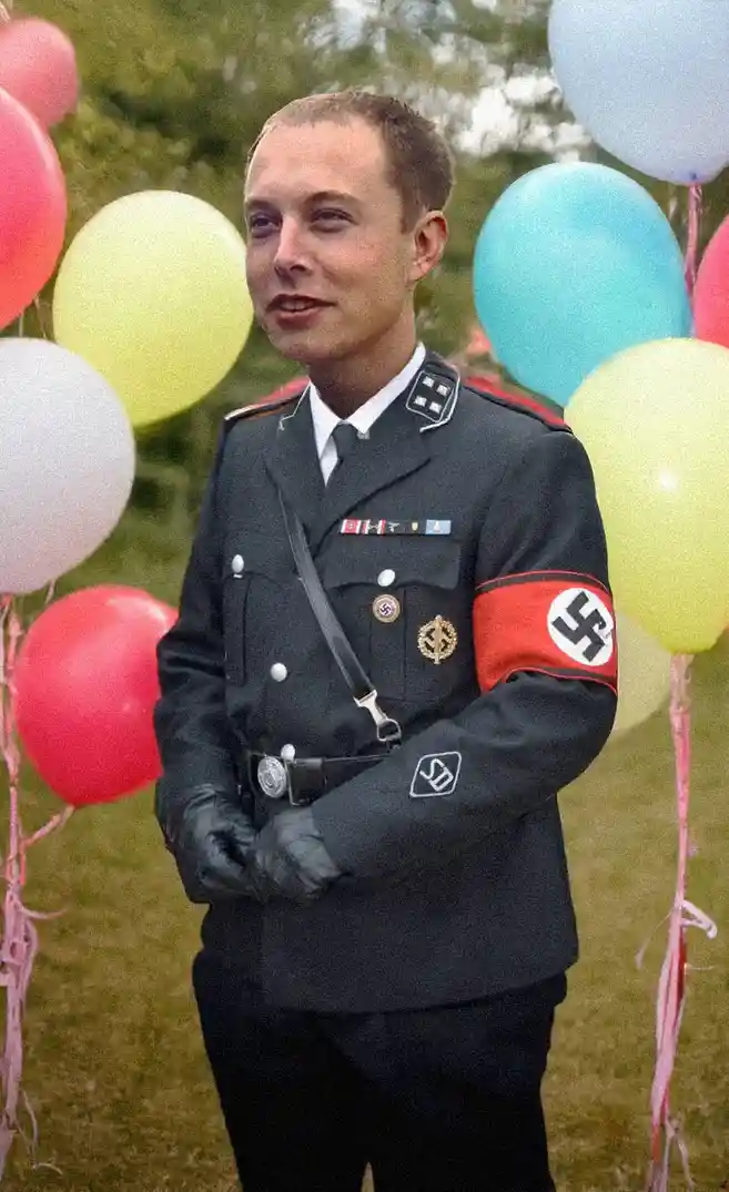 a man in a dark uniform with a swastika armband stands among colorful balloons, smiling slightly. The overlaid text reads…