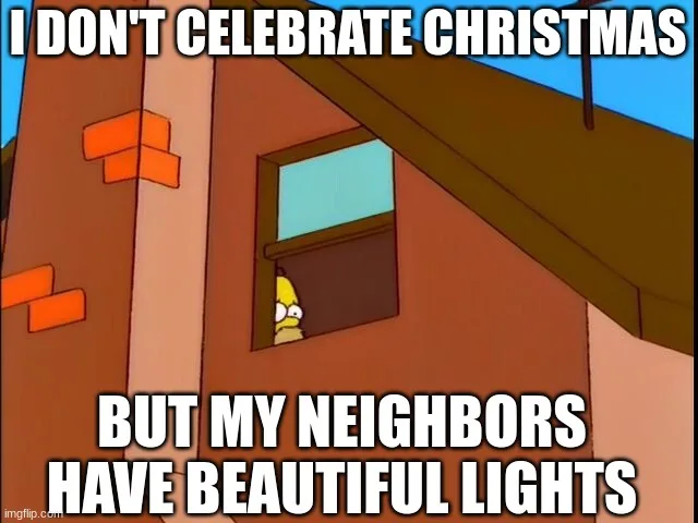 A cartoon image shows Homer Simpson peeking out from a window of a brown house with orange brick accents. The text overlaid…