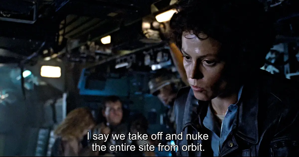 A still from the movie 'Alien' shows女主角 ash with a serious, determined expression in a dimly lit spaceship corridor. The…