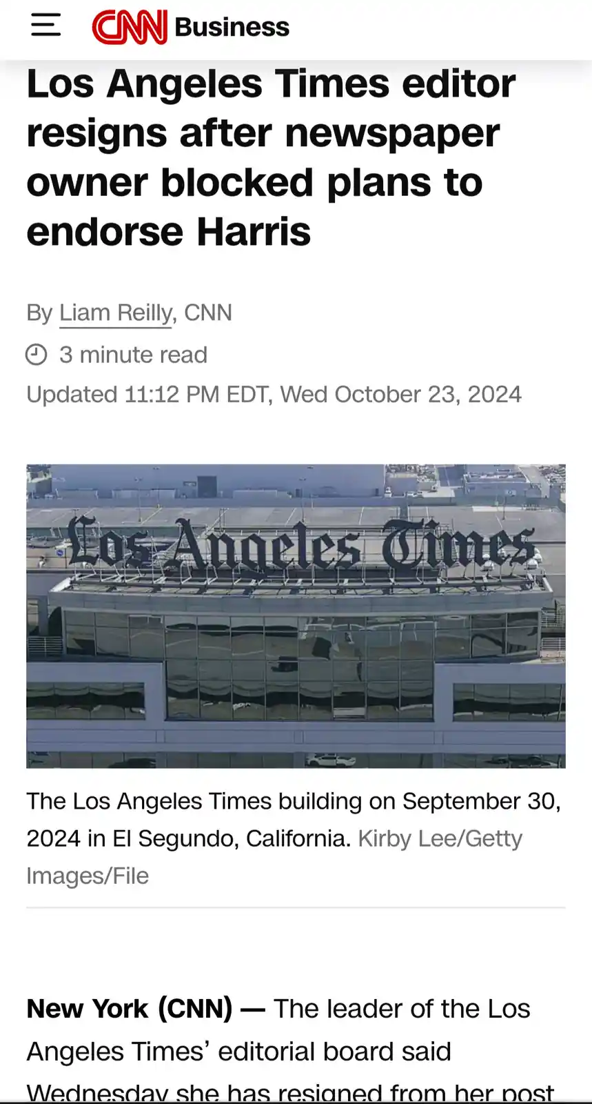 A screenshot of a CNN Business news article with the headline 'Los Angeles Times editor resigns after newspaper owner…