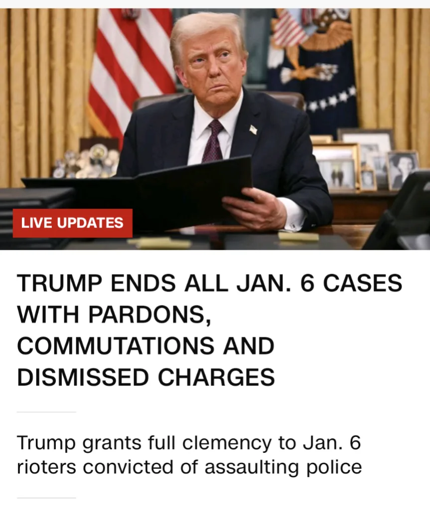 A still image of Donald Trump seated at a desk in an official-looking room, holding a folder, with an American flag and…