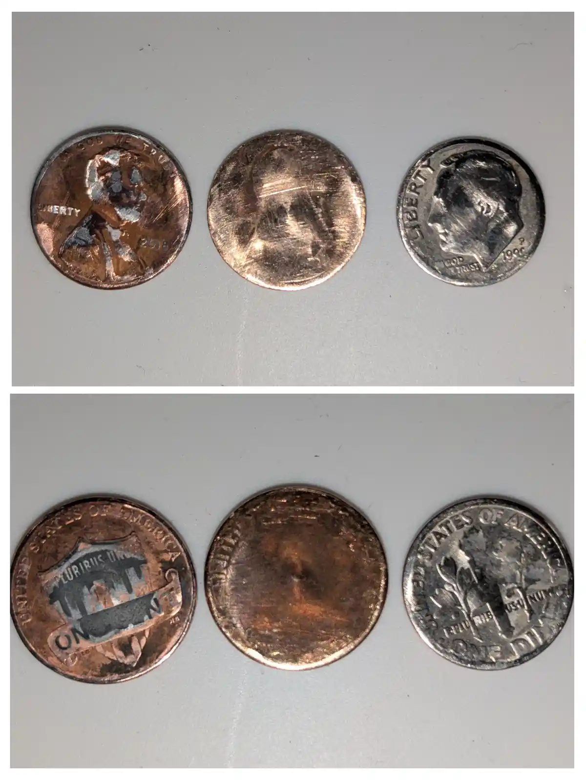 Two coins stuck in my washer for over a year, plus one from a few months back