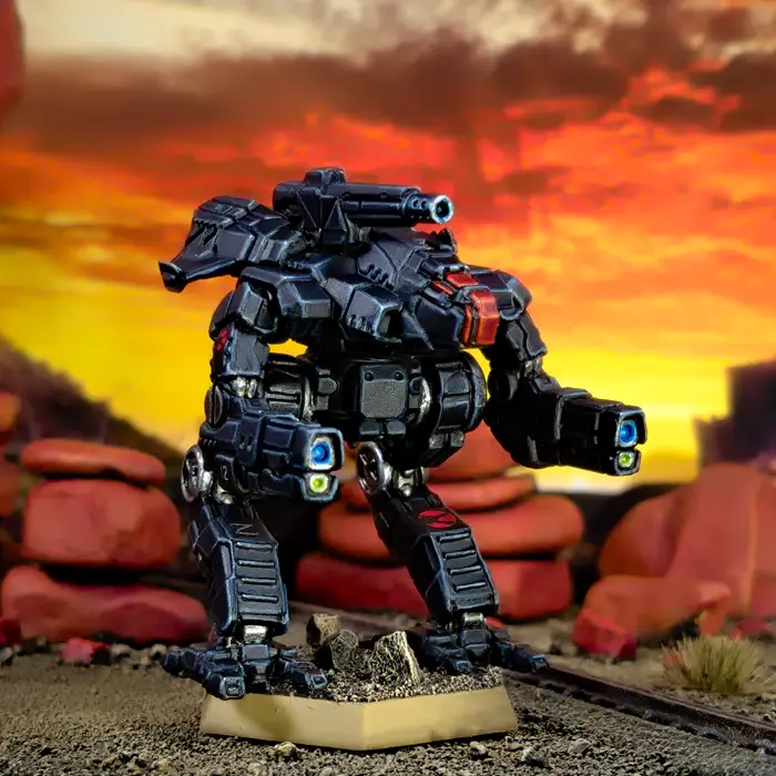 A heavily armored, black and red mech stands on a rocky, desert-like terrain with a fiery orange and red sunset behind it…