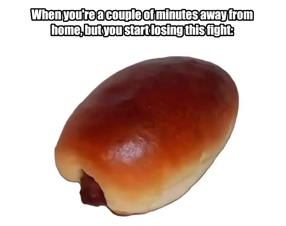 A close-up image of a hot dog in a bun, with the hot dog visibly protruding from one end of the bun. The bun is golden-brown…