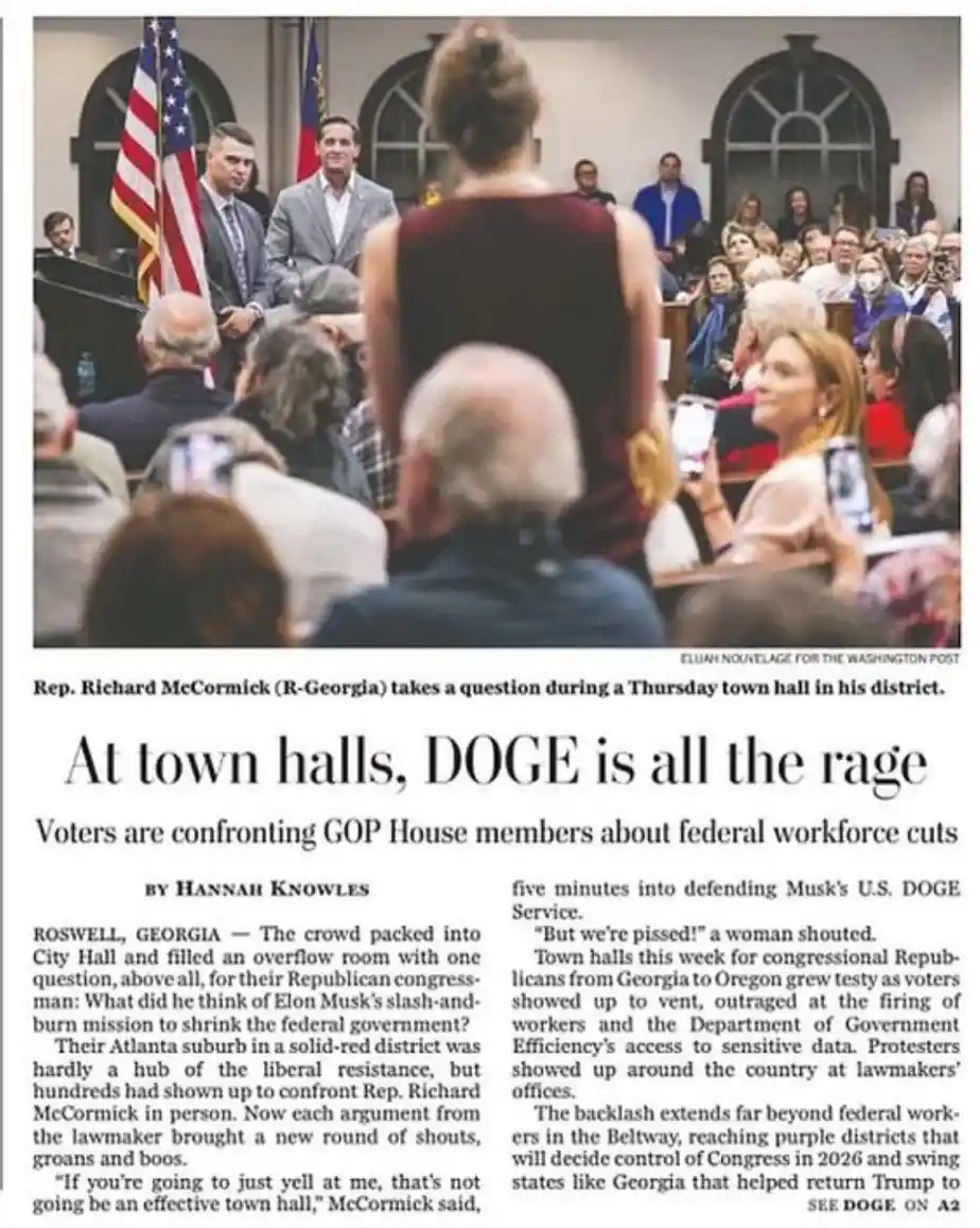 A newspaper clipping shows a town hall meeting with Rep. Richard McCormick (R-Georgia) standing behind a podium as a woman…