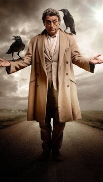 A man in a beige trench coat stands with arms outstretched on a desolate road, two black crows perched on his shoulders. The…
