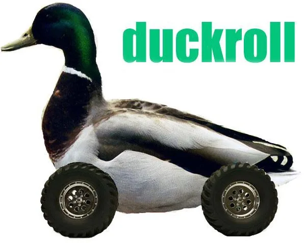 A mallard duck with a green head and white chest is digitally edited to have two large, rugged off-road tires attached to…