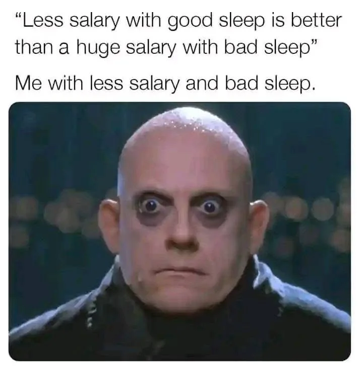 The image shows a close-up of a bald man with dark circles under his eyes, looking exhausted and horrified. The text above…