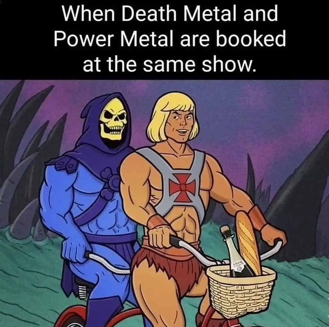 The image shows two cartoon characters, He-Man and Skeletor from the Masters of the Universe, riding a bicycle together…