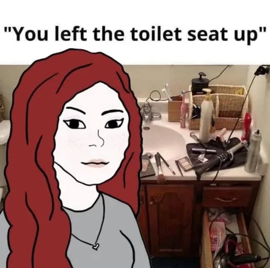 A cartoon drawing of a woman with long red hair and a neutral expression is superimposed over a messy bathroom scene. The…