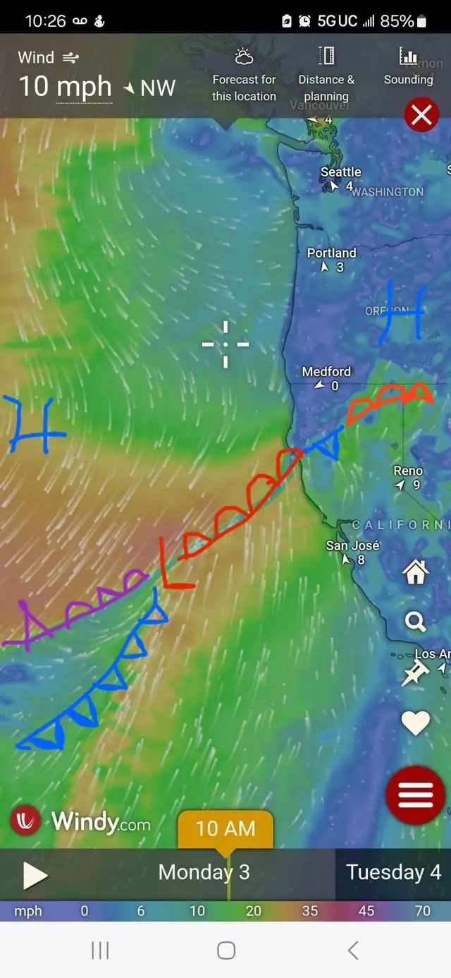 A screenshot of the Windy.com weather app showing a wind map of the Pacific Northwest with cities like Seattle, Portland…