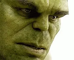 Six sequential close-up images of the Hulk's face show a progression from a stern, angry expression to a wide, toothy grin…