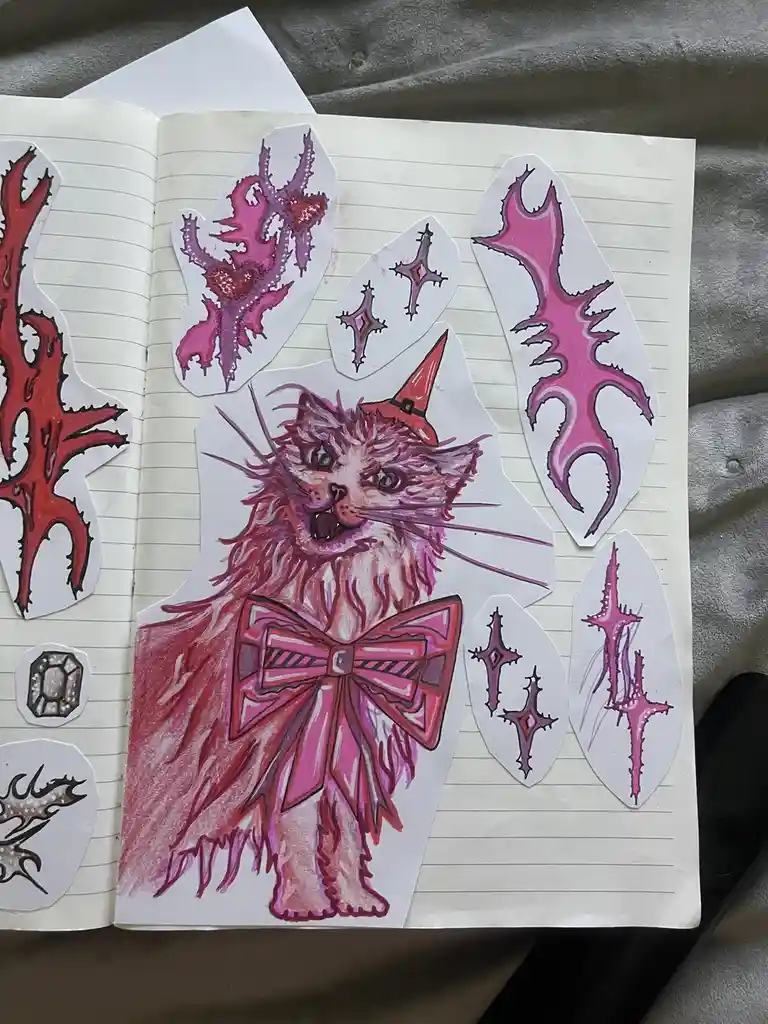 A hand-drawn illustration of a fluffy, pinkish-red cat wearing a small red witch hat and a large pink bowtie, surrounded by…