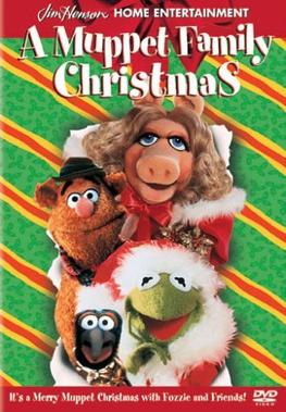 A DVD cover for 'A Muppet Family Christmas' shows Miss Piggy, Fozzie Bear, and Kermit the Frog in festive attire against a…