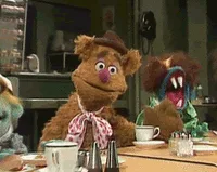 A sequence of six frames shows Fozzie Bear at a table, initially looking forward, then progressively leaning further back…