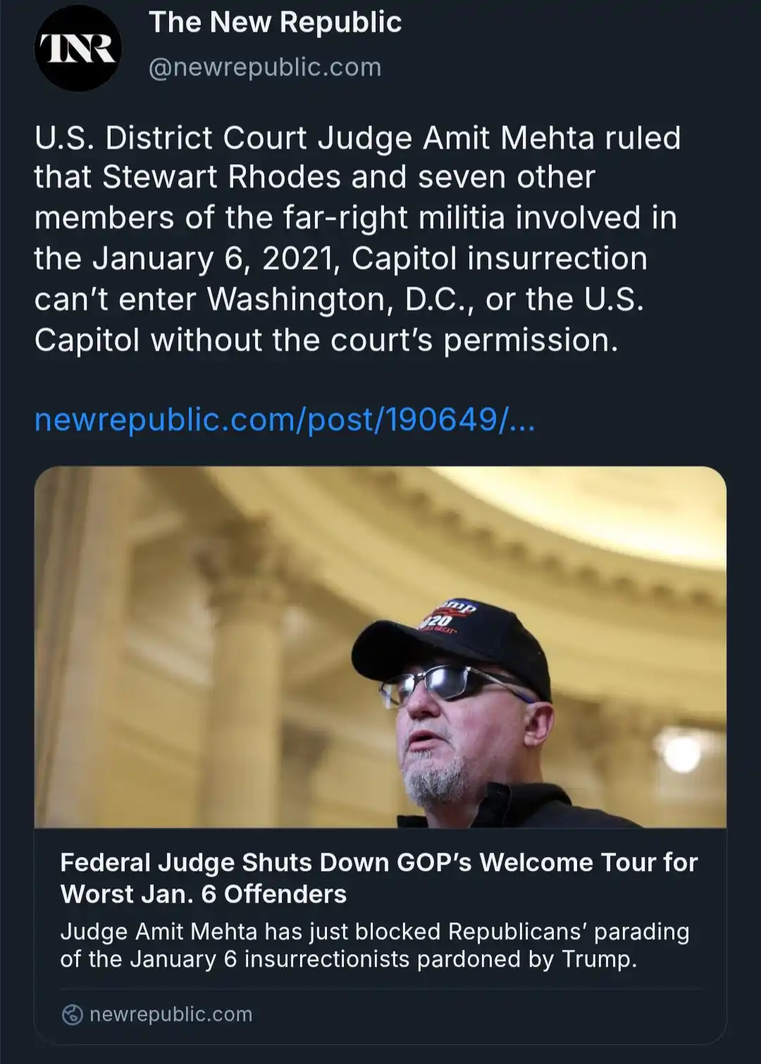 A screenshot of a tweet from The New Republic shows a photo of Stewart Rhodes wearing a black cap with 'Trump 2020' and…