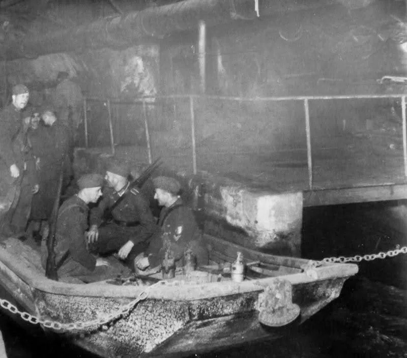 A German Patrol on the Hunt for Resistance Fighters in Paris Sewers, 1944.