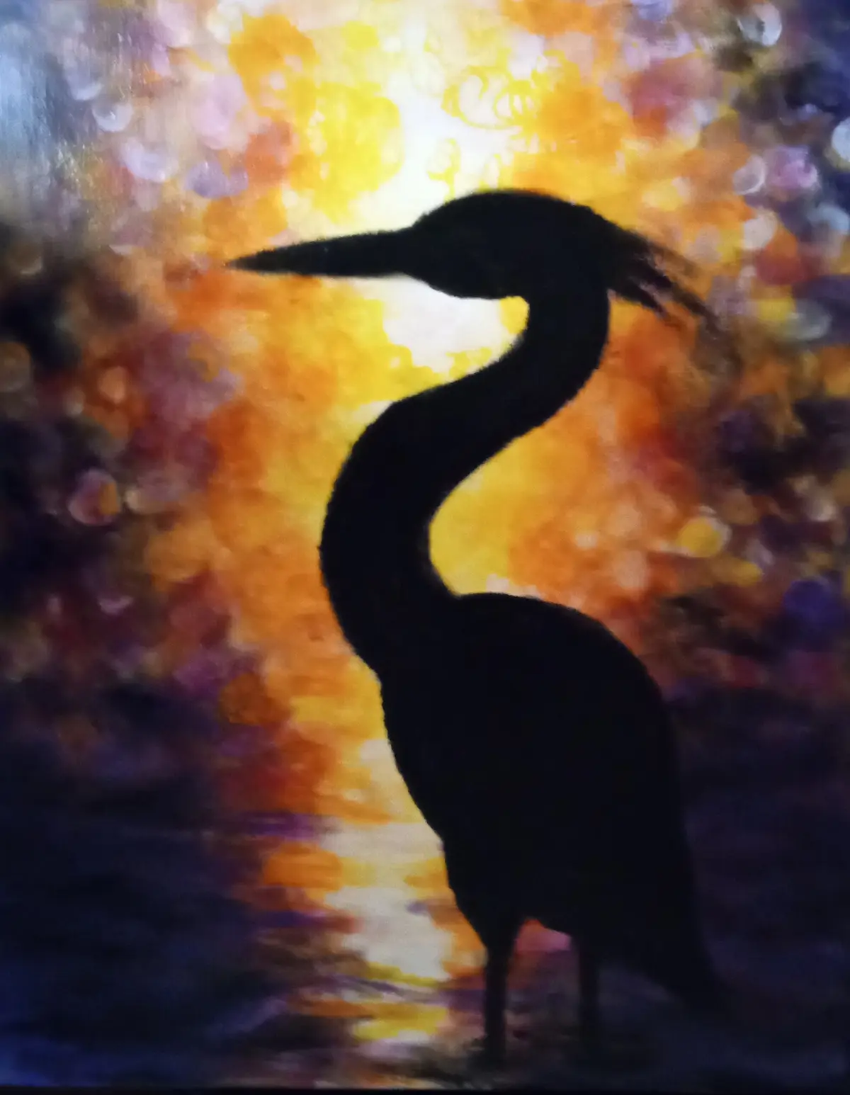 A black silhouette of a heron stands against a vibrant, abstract background of orange, yellow, purple, and blue splotches…