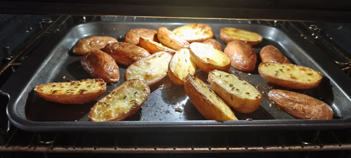 A Hearty Meal: Beef in Red Wine with Potatoes and Warm Apples