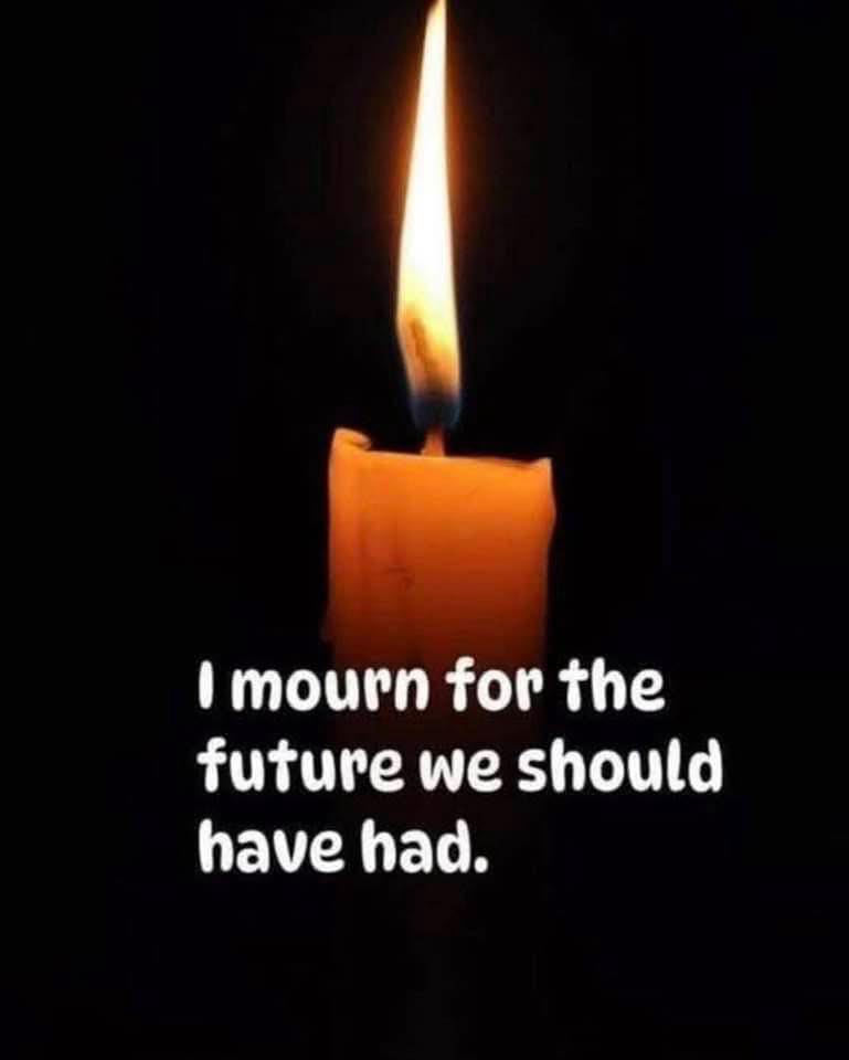 A single lit candle against a black background, with white text overlaid that reads 'I mourn for the future we should have…