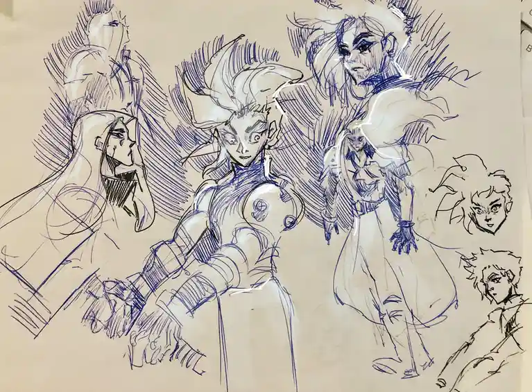 A blue ink sketch on beige paper shows multiple anime-style character designs, with a central, detailed figure surrounded by…