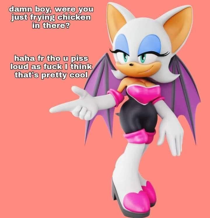 A figurine of the video game character Rouge the Bat from Sonic the Hedgehog, posed with one hand pointing forward, against…