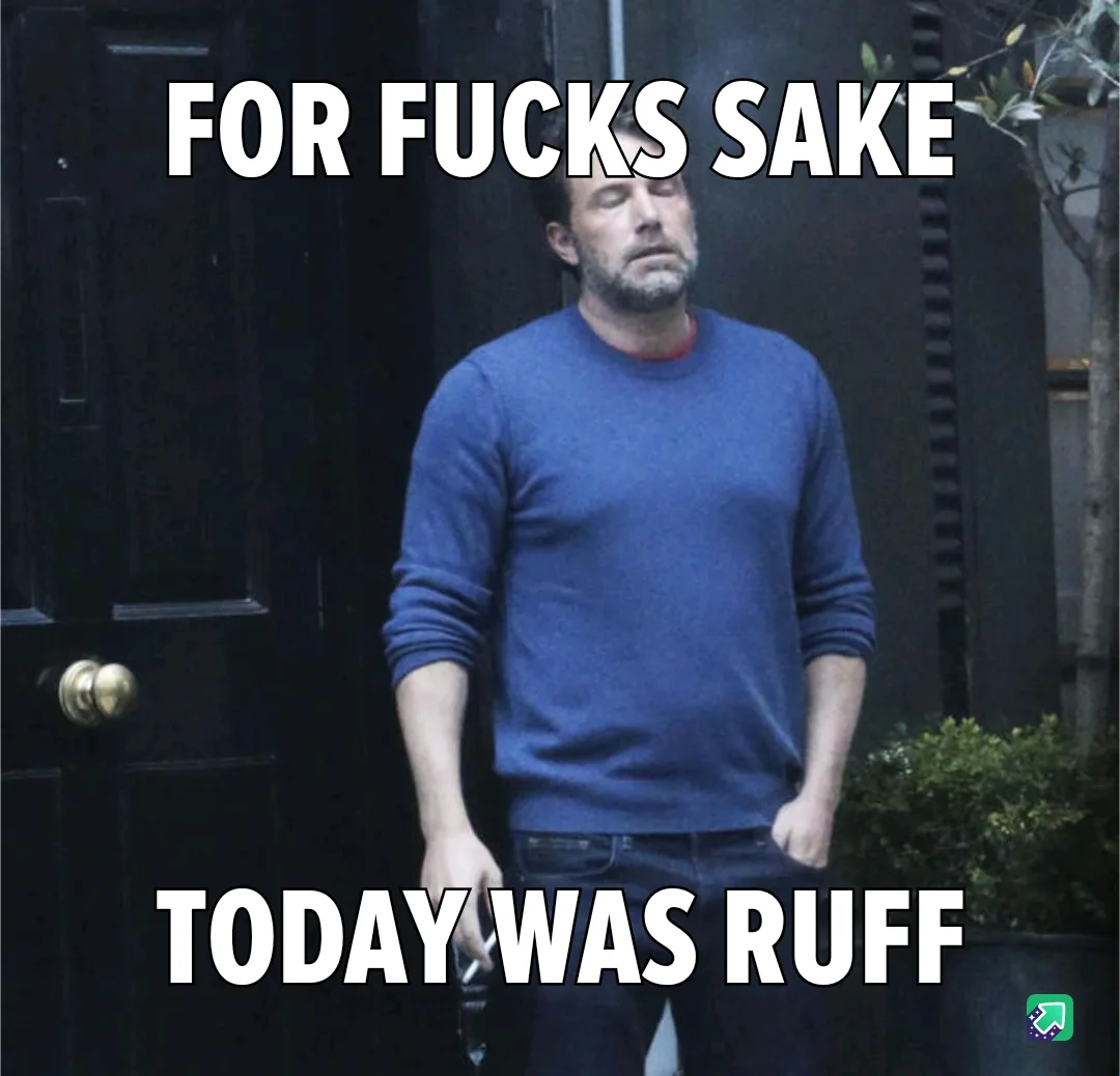 A man in a blue sweater stands outside a dark door with a weary, exasperated expression, hands in pockets. The image has…
