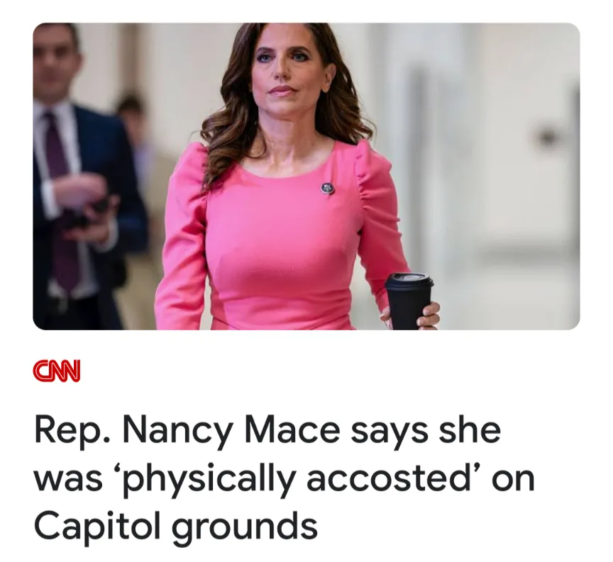 A woman in a pink dress holding a coffee cup walks forward with a serious expression, overlaid with a CNN headline stating…
