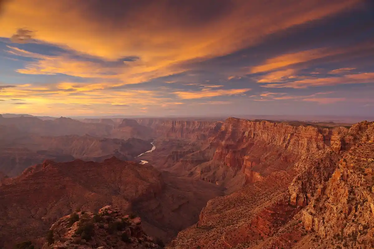 The Breathtaking Sunset Glow Over Navajo Point's Canyon Cliffs