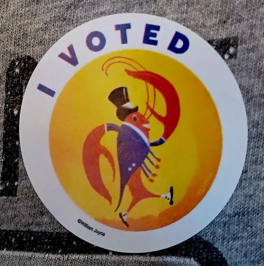 A circular 'I VOTED' sticker features a cartoon lobster wearing a top hat and tuxedo, dancing with its claws raised against…