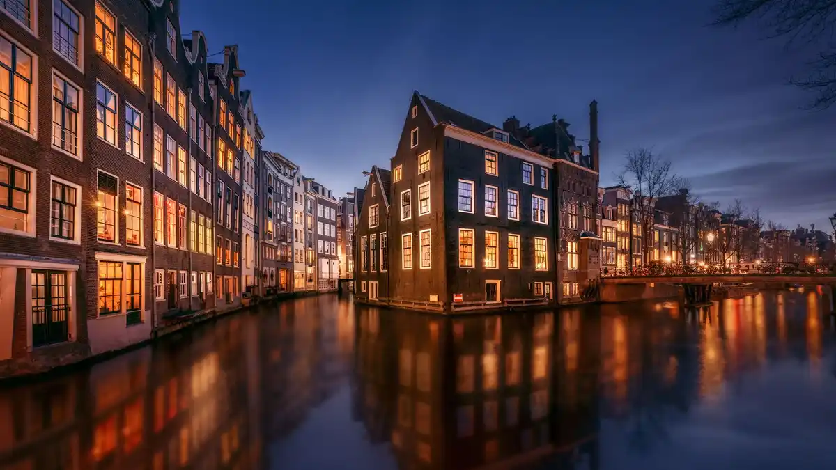 Amsterdam's charms unfold with iconic landmarks, vibrant tulip beds, colorful trams, and savory streetside eats…