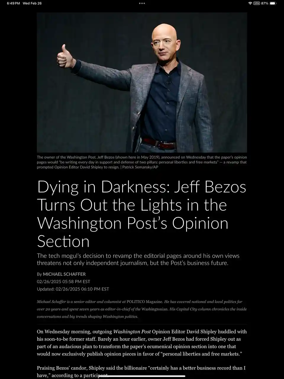 A screenshot of a Politico article shows Jeff Bezos giving a thumbs-up while wearing a grey blazer and dark shirt. The…