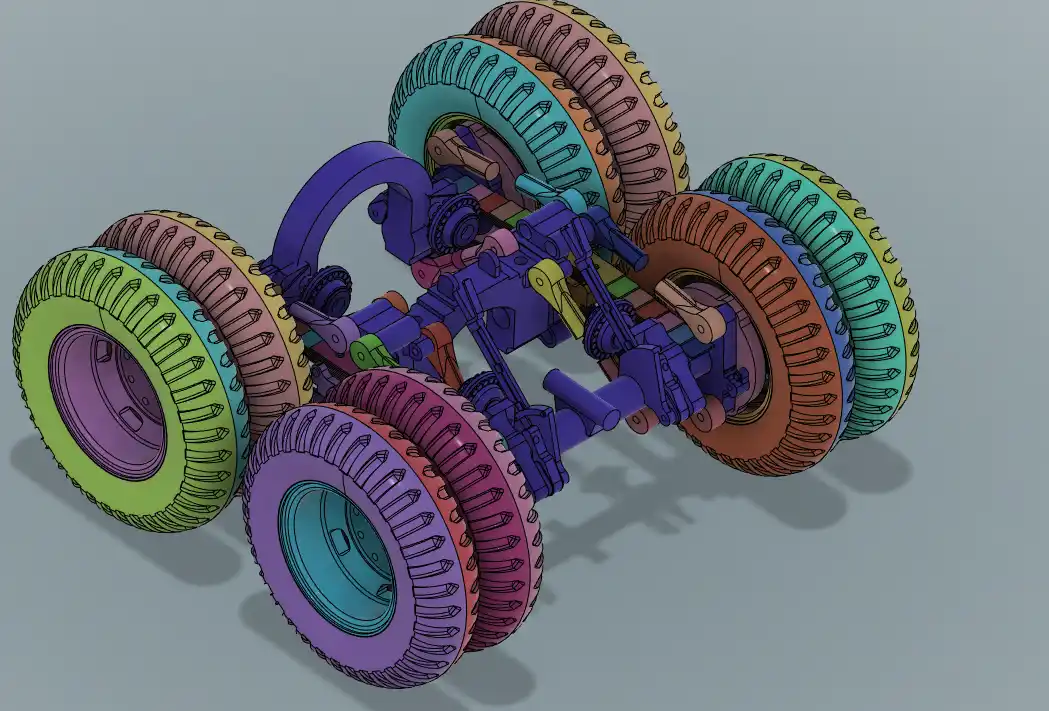 A 3D rendered technical model of a vehicle chassis with four oversized, multi-colored wheels featuring spiked treads. The…