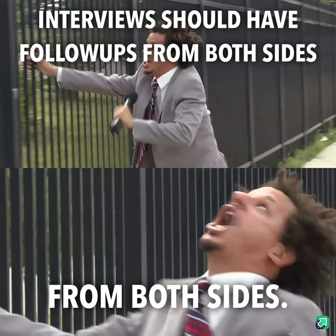 A man in a gray suit and striped tie stands outside a black metal fence, holding a microphone and yelling with his arm…