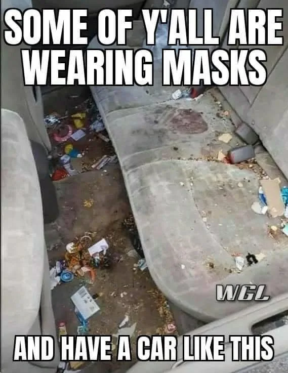 The image shows the interior of a very dirty car, with the floor and seats covered in trash, food wrappers, and debris…