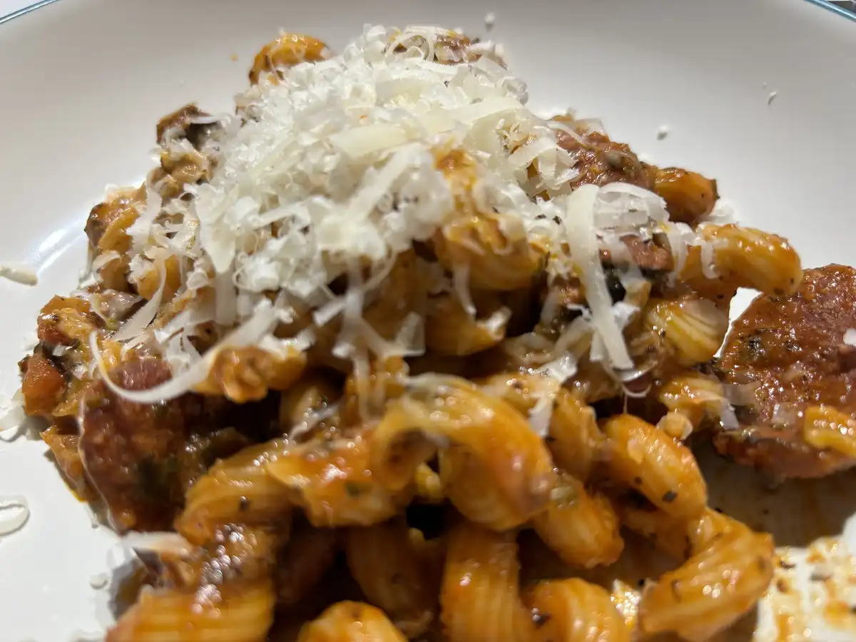Culinary experiment: King Blue Oyster Mushrooms and beef sausage in a rich red sauce over cavatappi
