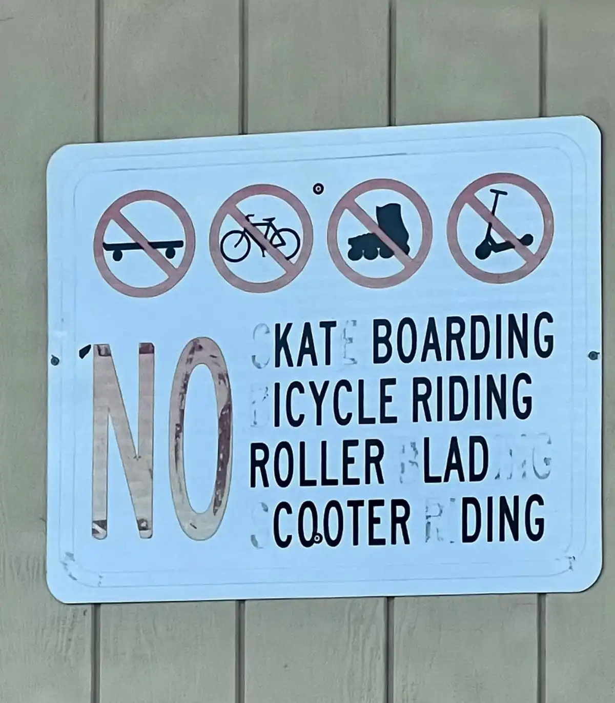 The Weathered Sign at My Husband's Work: A Favorite of Mine