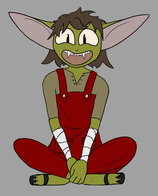 A green-skinned, large-eared cartoon character with brown hair, fangs, and bandaged arms sits cross-legged in red overalls…