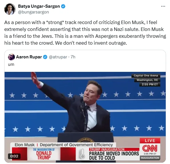 A screenshot of a CNN news broadcast shows Elon Musk raising his right arm in a gesture resembling a Nazi salute while…