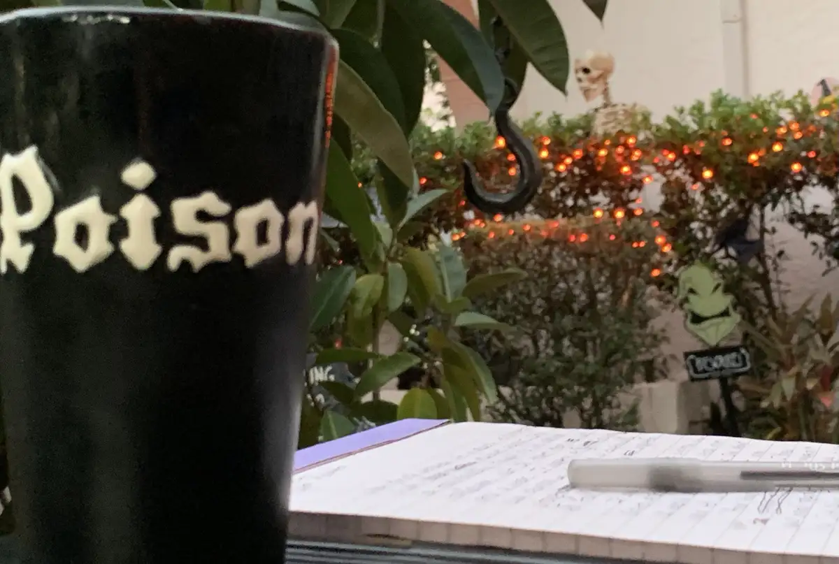 Sitting outside, waiting for trick-or-treaters while crafting eerie tales